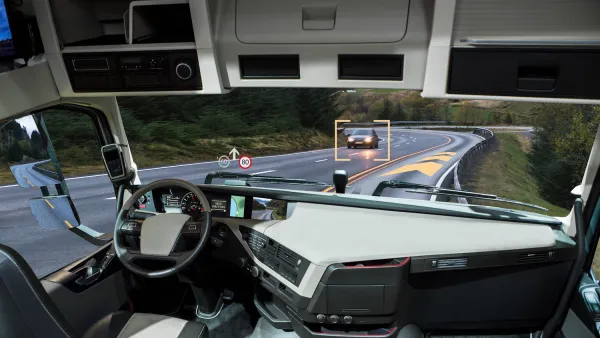 Inside of self-driving truck on road.