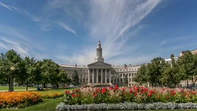 Denver City Hall building with green lawn and red flowers in front, Denver, Colorado