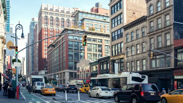 Traffic and old buildings in Manhattan, New York City.