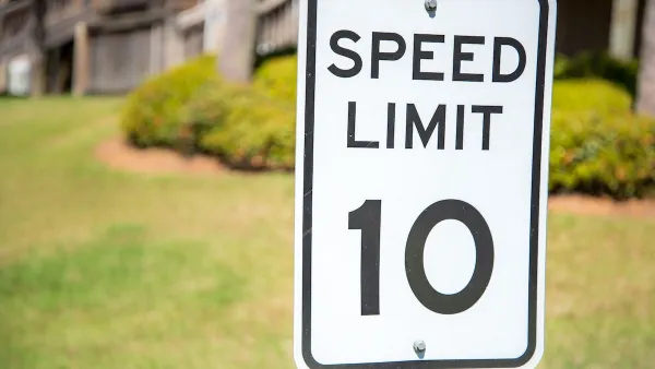 Close-up of 10 mph speed limit sign.