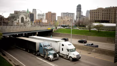 Freeay with Detroit skyline in background.