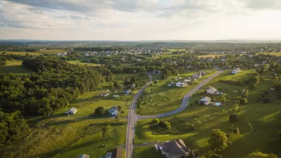 Aerial view of green rural community with houses in Pennsylvania.
