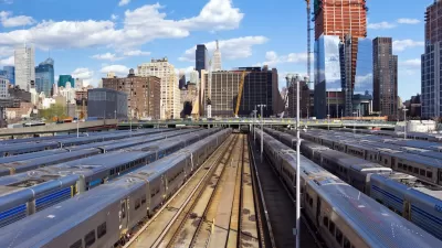 View of trainsin Hundson Yards and New York City skyline.