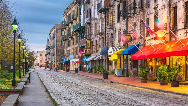 Cobblestone street with vintage street lamps in Savannah, Georgia.