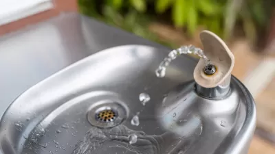 Close-up of silver modern drinking fountain.