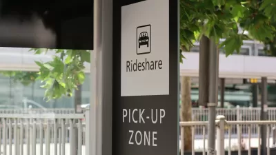 Black and white Rideshare Pick-Up Zone sign