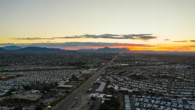 Aerial view of mobile home park next to freeway in Mesa, Arizona