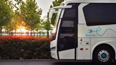 Close-up of front side of white electric bus