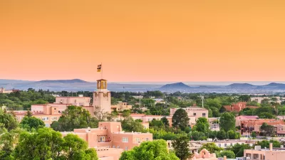 Aerial view of historic core of Santa Fe, New Mexico at dusk.