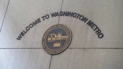 Sign on concrete wall "Welcome to Washington Metro" with WMATA seal.