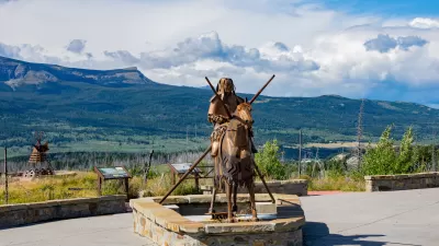 Blackfoot memorial statue in Glacier National Park of Native American sitting on horse