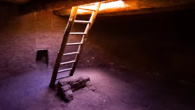 Ladder going down into kiva ruin in New Mexico.