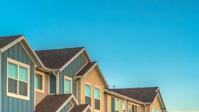 View of upper story of row of townhomes.