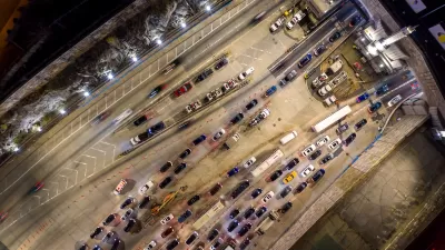 Bird's eye view of traffic entering Lincoln Tunnel in Weehawken, New Jersey heading into Manhattan, New York City.