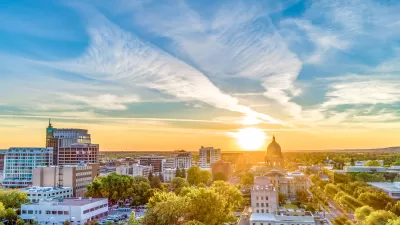 View of Boise, Idaho timeline with state capitol dome against early sunset sky