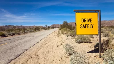Yellow Drive Safely on desert road