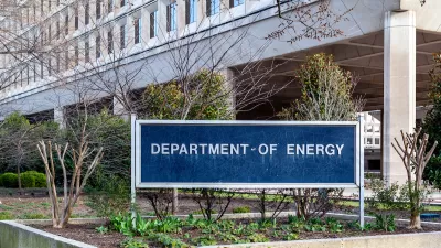 Department of Energy sign in front of modernist building in Washington, D.C.