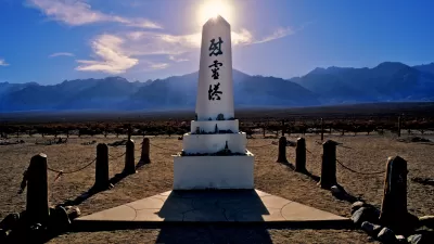 White obelisk monument with Japanese writing at Manzanar Historic Site, former internment camp, California