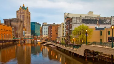 View of river and commercial buildings in downtown Milwaukee, Wisconsin.