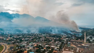 Aerial view of Lahainaluna neighborhood with smoke from fires in Maui, Hawaii.