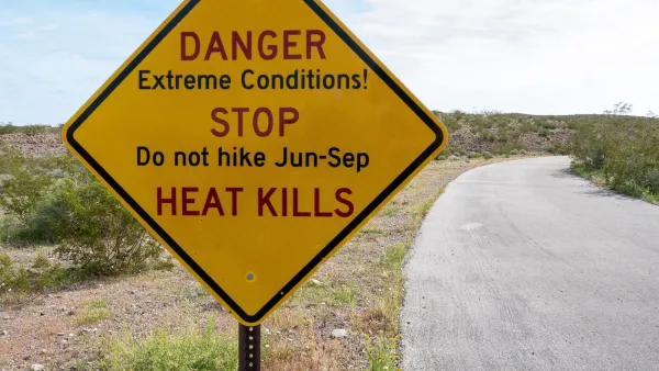 Yellow roadside sign with extreme heat warning: "Danger - Extreme Conditions! - STOP - Do not hike Jun-Sep - HEAT KILLS"