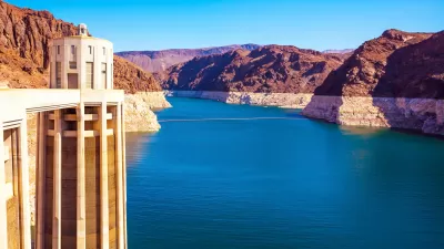View of Colorado River from top of Hoover Dam with concrete column on left