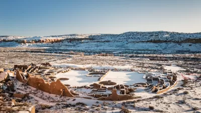 Native American ruins at Chaco Culture National Historical Park in winter with snow.