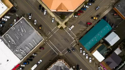 Aerial view of strip mall with diagonal parking spots in Coquille, Oregon
