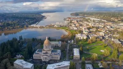 Aerial view of Olympia, Washington with state cpaitol dome in foreground on a somewhat cloudy day.