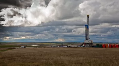 Oil drilling rig on plain in the Midwest.