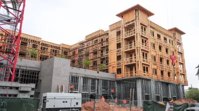 Five-story apartment building under construction.