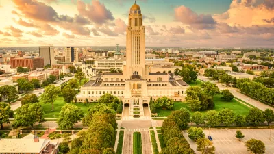 Aerial view of Nebraska state capitol and downtown Lincoln, Nebraska in golden light.