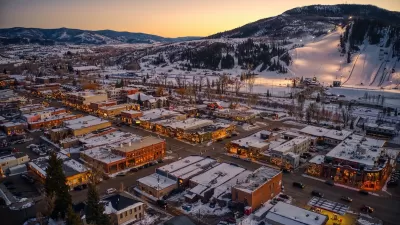 Aerial view of mountain town of Steamboat Springs, Colorado in the winter with snow at dusk.