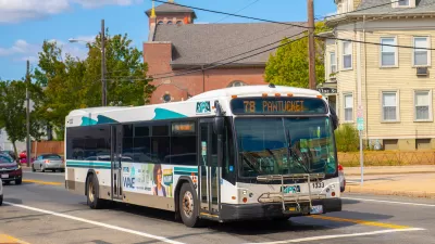White and green Rhode Island Public Transit Agency bus