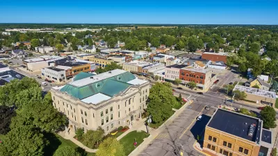 Aerial view of downtown Auburn, Indiana on a clear, sunny day.