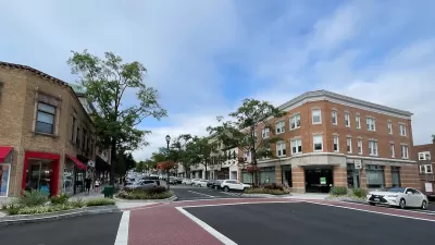 View of empty brick crosswalk in shopping district in Greenwich, Connecticut