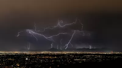 Lightning strikes over Tucson, Arizona at night during monsoon storm