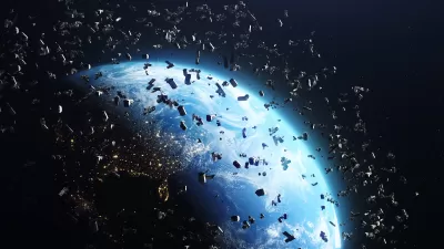 Rendering of many satellites in near-earth orbit with earth visible behind them.