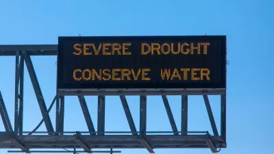 "Severe Drought - Conserve Water" freeway sign.