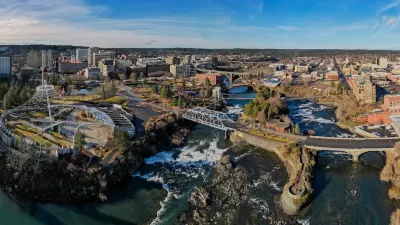 Aerial view of Spokane, Washington with river in foreground.