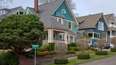 Teal and blue two-story houses in Seattle's historic Queen Anne neighborhood