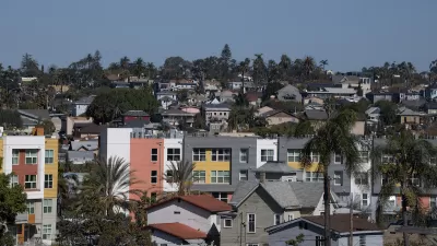 View of dense San Diego neighborhood with multi-family buildings.