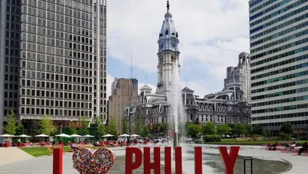 "I [heart] Philadelphia" sign in front of fountain with city hall building in background