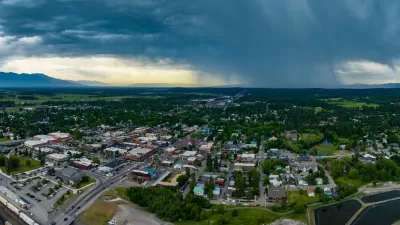 Aerial view of Whitefish, Montana with storm clouds in background