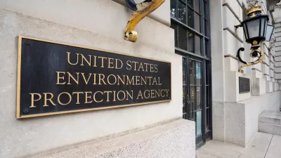 Close-up of bronze plaque on building with "United States Environmental Protection Agency" text.