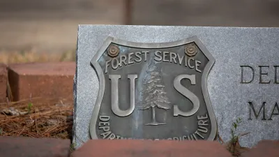 Close-up on U.S. Forest Service plaque.