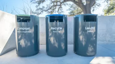 Three grey trash cans labeled with Compost, Recycle, and Landfill in English and Spanish on a concrete walkway in a park in Austin, Texas.