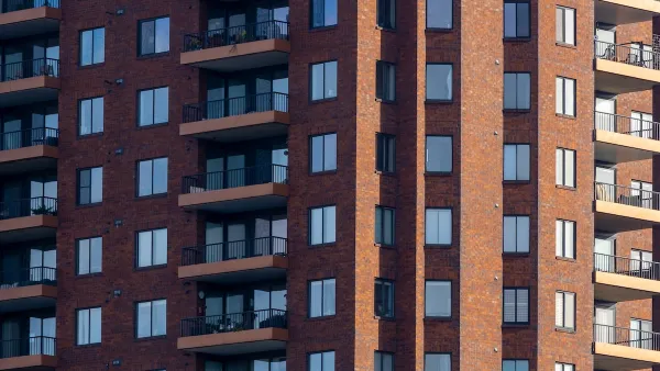 Close-up of facade of red brick high-rise apartment building in Columbus, Ohio.