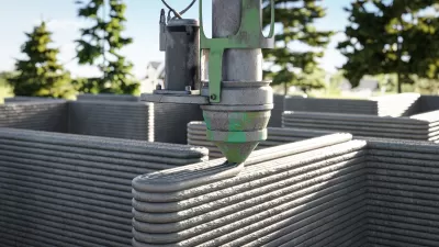Close-up of CNC machine 3D printing a concrete house wall.