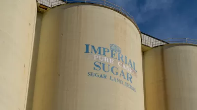 Close-up of silos with Imperial Sugar logo in Sugar Land, Texas